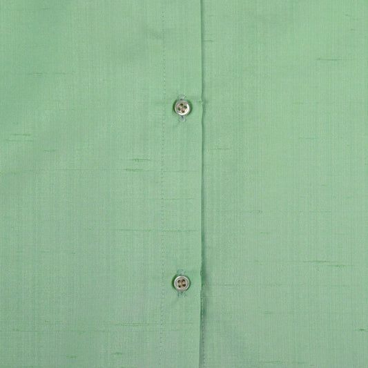 close up upcycling fabric mint green with white buttons