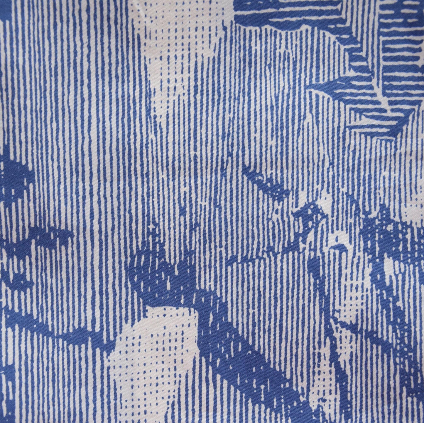 Upcycling cotton fabric with white and blue abstract pattern